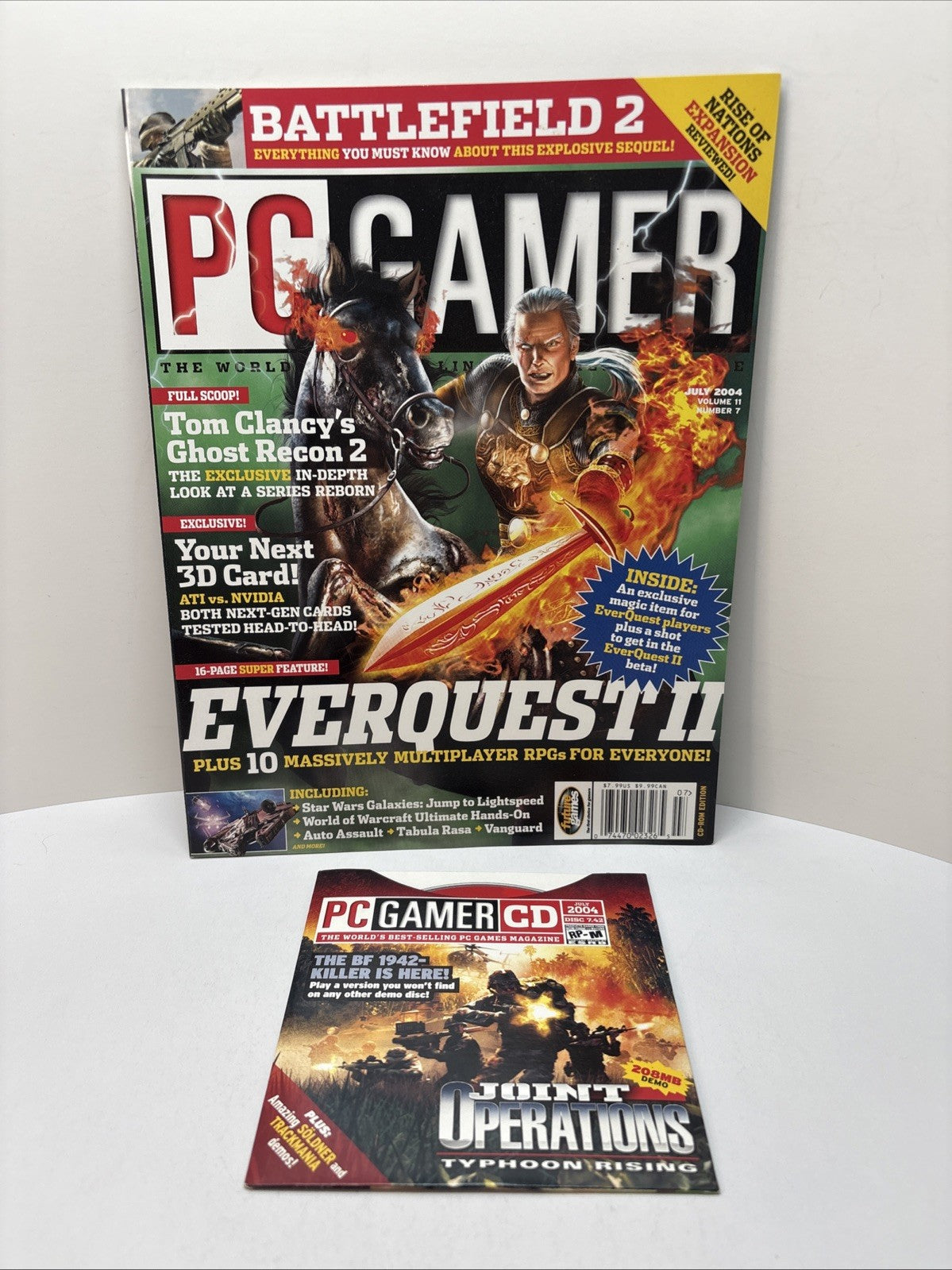 PC Gamer magazine #125, July 2004, Everquest II cover - With Demo Disc