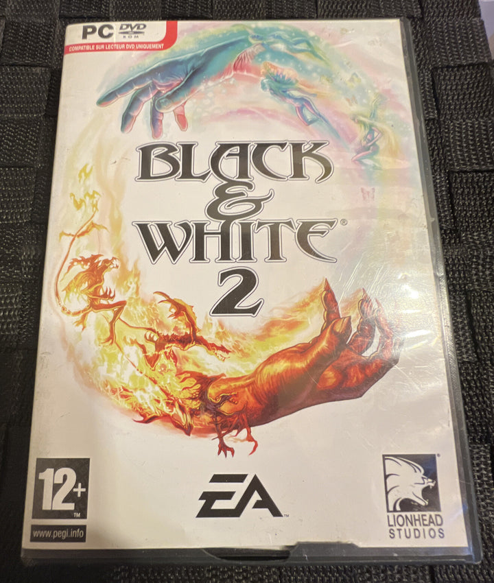 BLACK & WHITE 2 PC DVD - French Version - Case dmg - Scratched Cd - Sold As Is